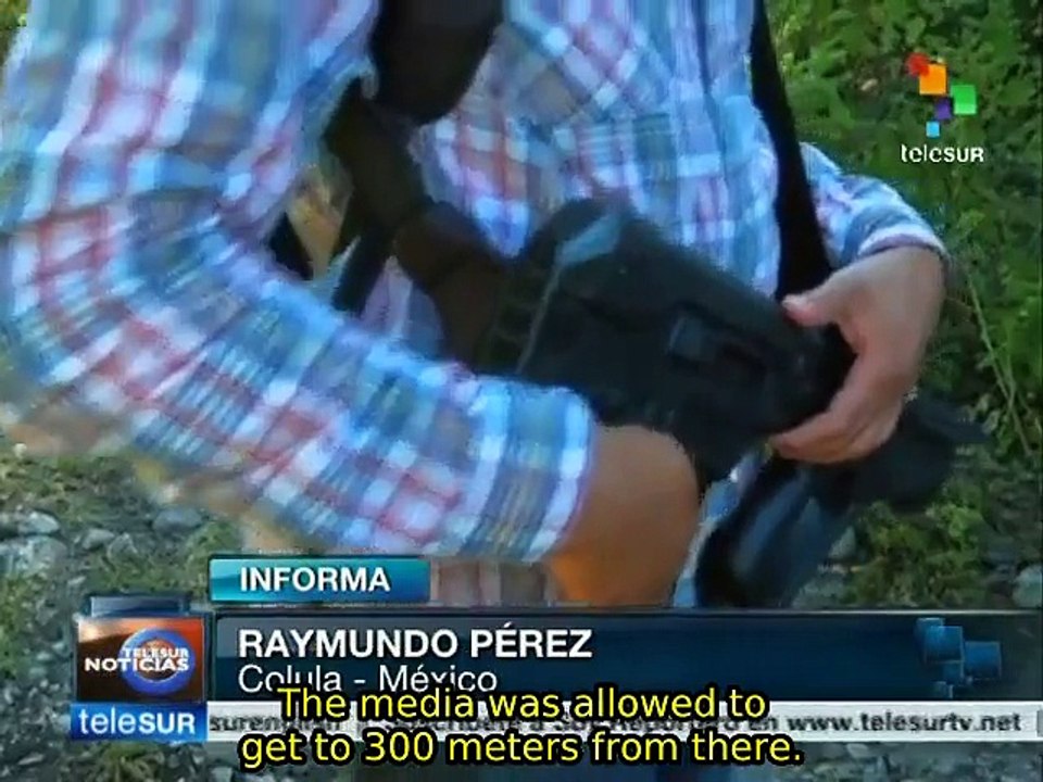 Mexico: Forensic experts investigating a clandestine grave in Colula