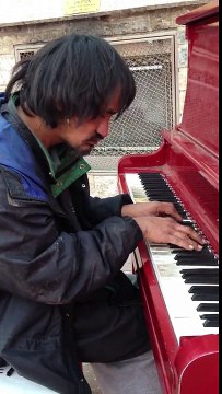Homeless Man on the street plays beautifully AMAZING