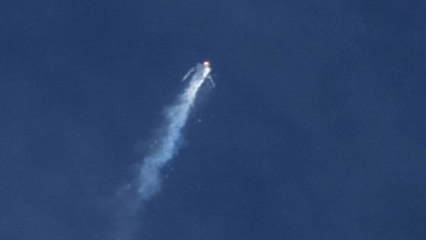 Photos capture Virgin spaceship 'mid-air explosion'