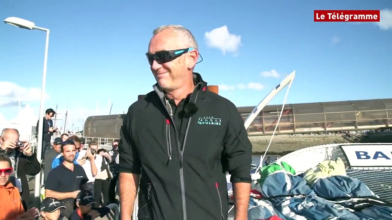 Route du Rhum - Destination Guadeloupe. Banque Populaire quitte le ponton pour rejoindre son mouillage