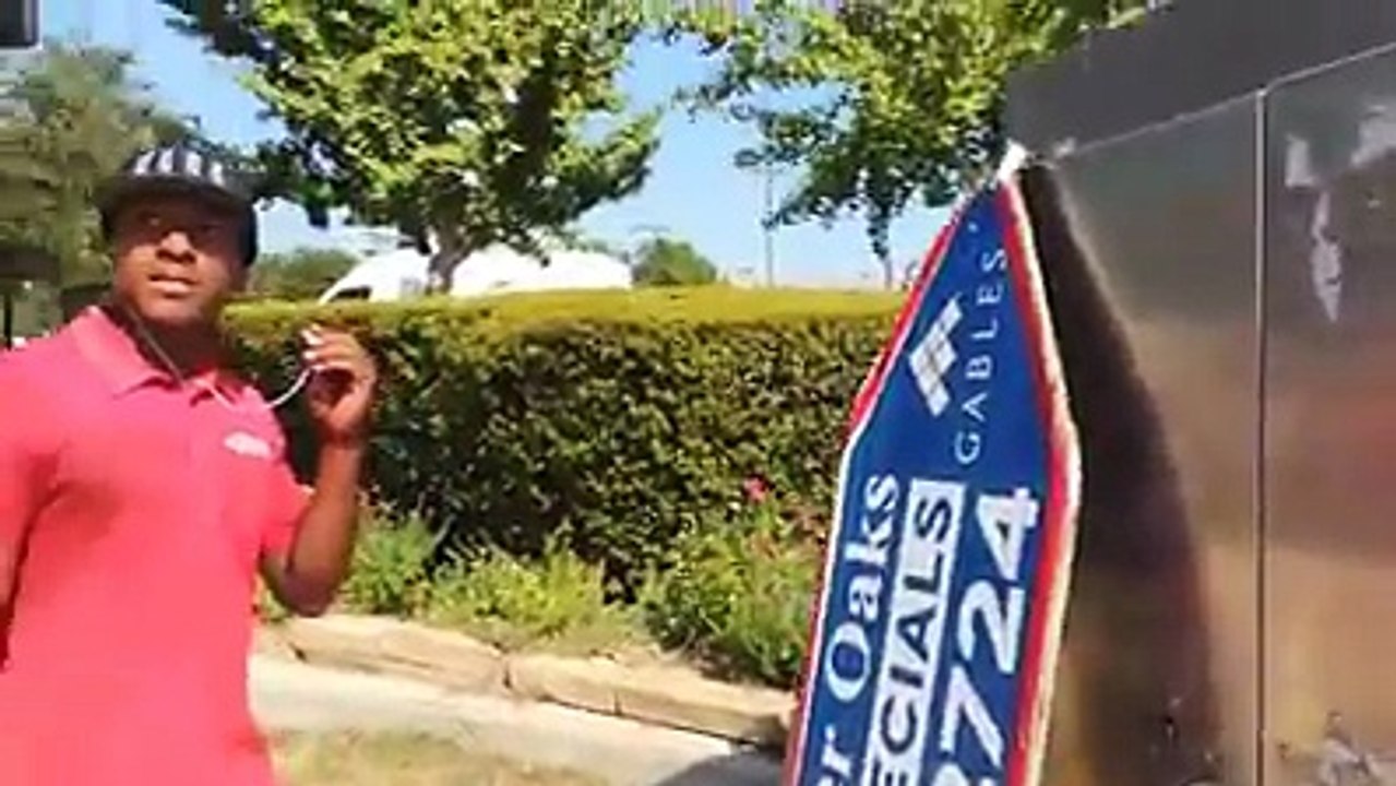 holding a sign board