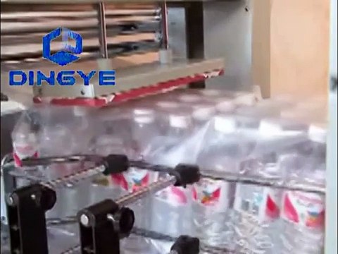 máy rút màng co lốc chai nước, máy co màng lốc nước yến