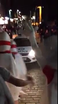 Police knock down human bowling pins