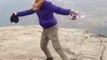 Tourist Nearly Swept Off Exposed Rock by Strong Winds