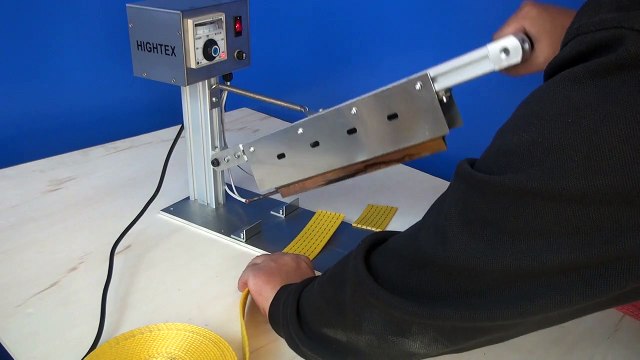 Hot knife cutting machine for synthetic webbing slings