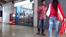 Guy asks a random girl to buy condom, gets slapped!