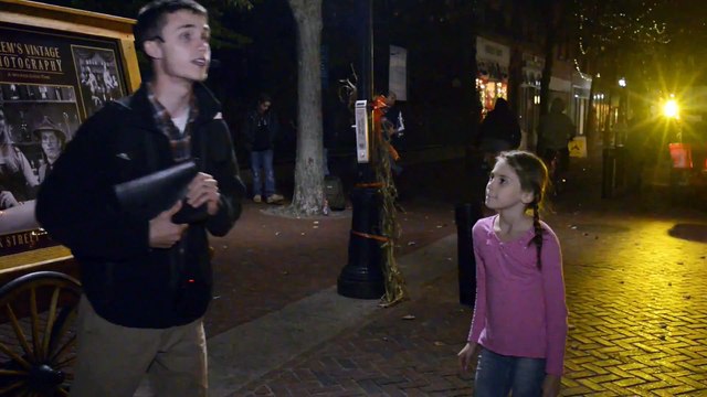 Young Girl screams at Street Preacher