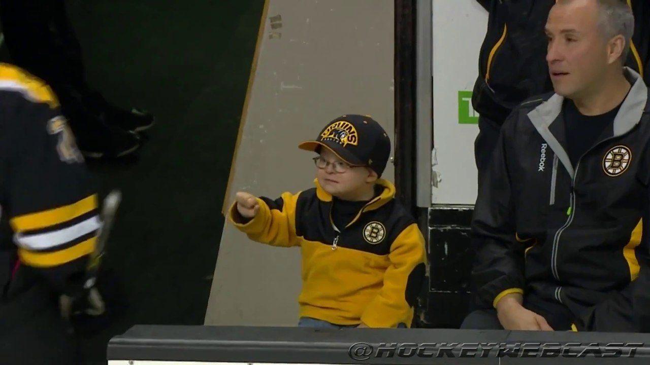 So cute Young Fan Fist Bumps Boston Bruins Hockey players!