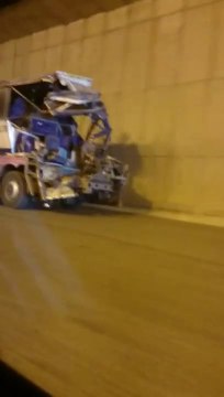 Destroyed bus still driving on highway. Crazy!