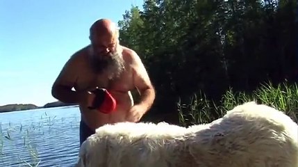Old Man Trying To Get His Dog To Take A Bath