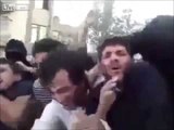 Iranian Regime Forces Parade and Beat Young Men