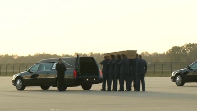 Remains of five MH17 crash victims are flown to Netherlands