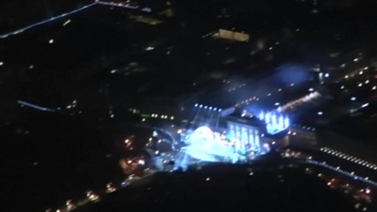 Passengers take special flight over Berlin Wall light installation