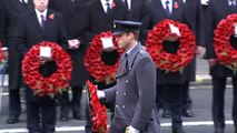 Duchess watches from balcony as William lays wreath