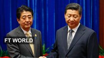 China's Xi meets Japan's Abe in bid to bridge gulf