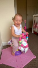 Energetic baby bounces adorably