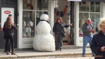 Evil snowman scares unsuspecting passersby