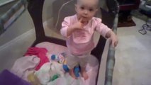 One-year-old talks her way out of a nap