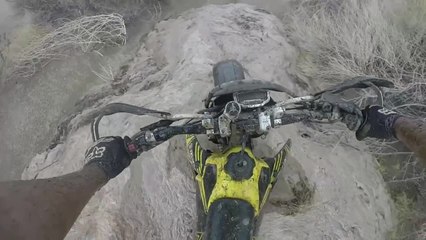 Riding through a flash flood on a dirt bike