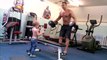 Adorable toddler works out with his dad