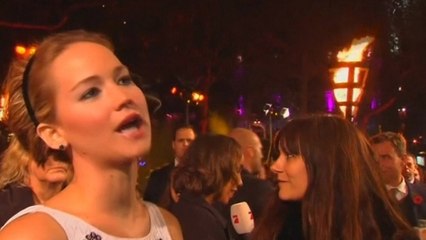 Lawrence premieres "Mockingjay," Gordon-Levitt to play Snowden