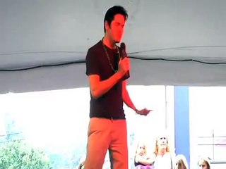 Dean Z sings All Shook Up at Elvis week in memphis video