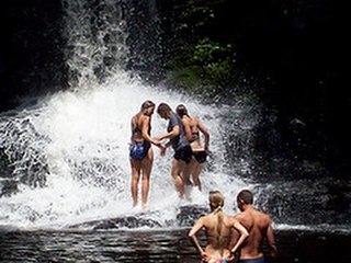 foreigner enjoy waterfall in goa