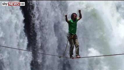 Man walks Victoria Falls on Tightrope