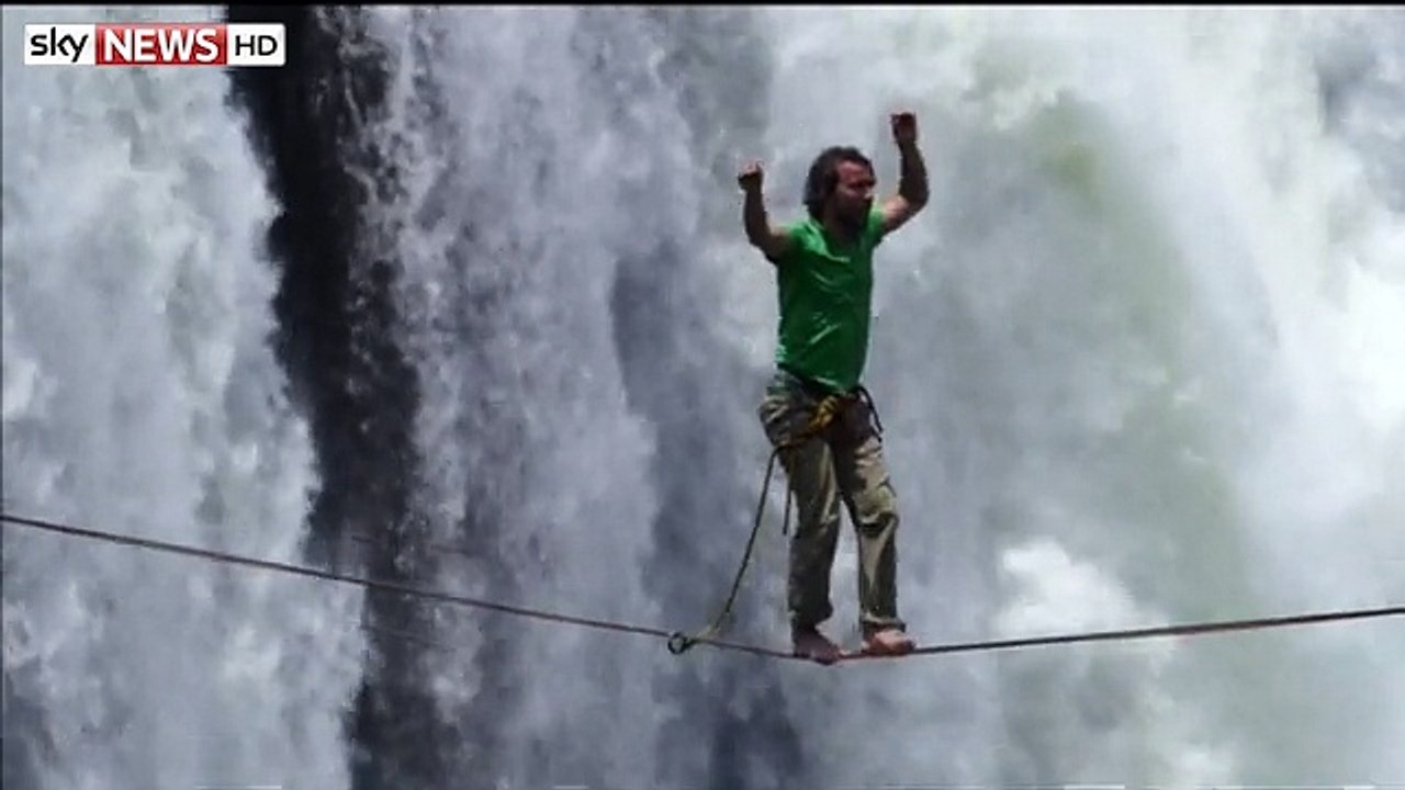 Man walks Victoria Falls on Tightrope