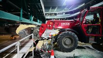L'installation des terrains de la Coupe Davis au Grand Stade