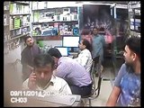 CCTv photage of mobile phone shop robber