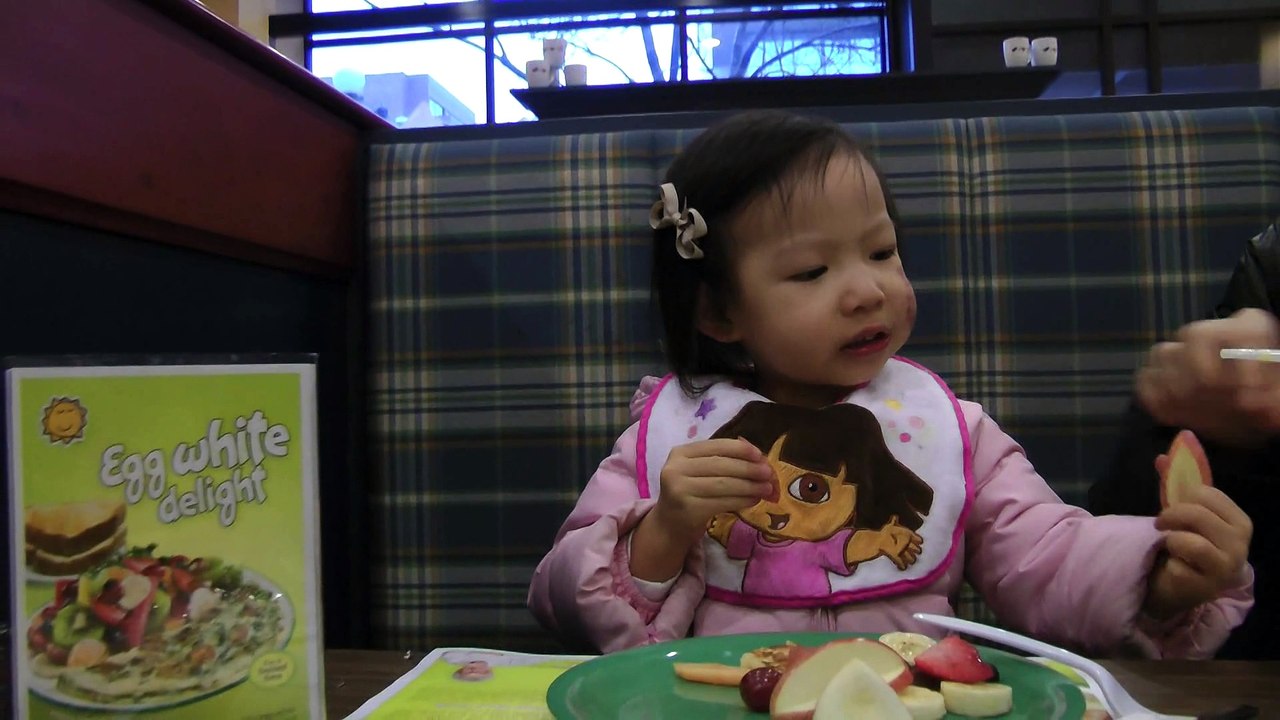 Girl Having Breakfast At Cora