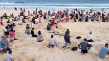 Protestants du G20 mettent la tête dans le sable