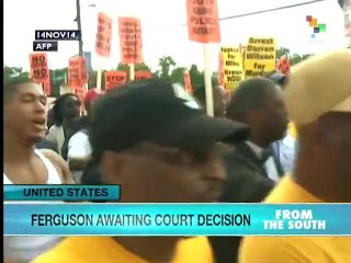 Ferguson awaiting court decision as tension mounts