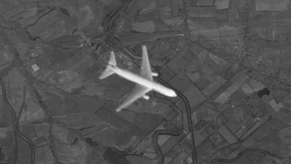 Russian TV channel says photos show MH17 shot down by fighter jet