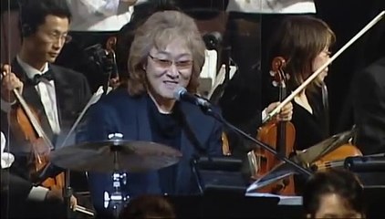 Kenji Kawai Live - (Ghost in the Shell Innocence) - Opening Theme (Kugutsuuta ura mite chiru) - YouTube (1)
