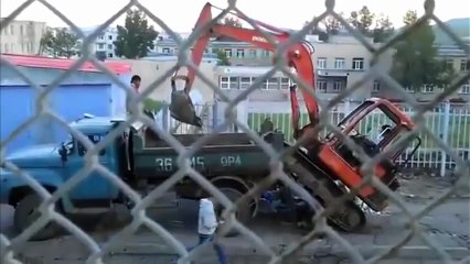 Insane Excavator Loading Trick