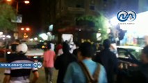 متظاهرو الإخوان يقطعون طريق الهرم بعد إشعال النار أمام السيارات بالطالبية