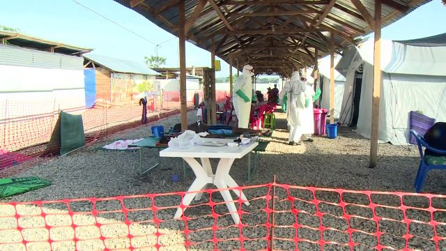Health workers in Sierra Leone dance to cheer up Ebola patients