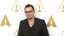 Bono injures his arm, Jessica Lange honored