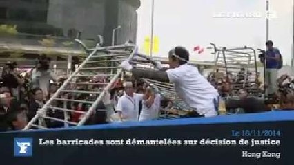 Hong Kong : la justice fait démanteler les barricades des manifestants