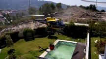 Firefighting Helicopter Fills Up At Pool