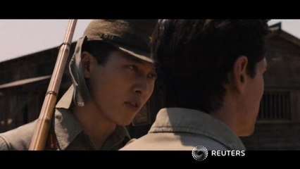 Angelina Jolie says POW film will help through "dark times"