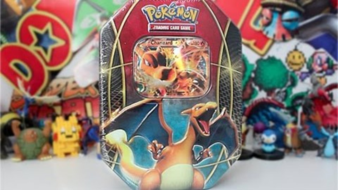 Opening A 2014 Pokemon Power Trio Charizard Tin