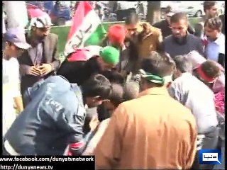 A man injured by Tahir ul Qadri’s bomb proof  Car