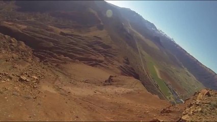BASE jumper flies away after scary cliff strike