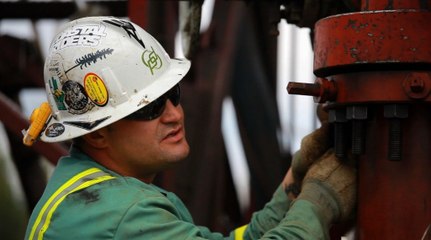 Extracting oil sands for the Keystone XL pipeline