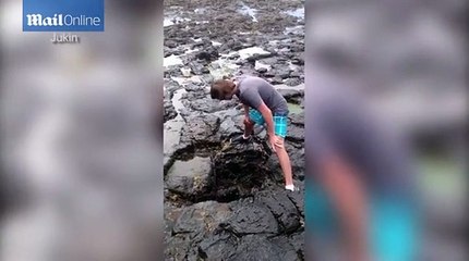 Is my face broken-' Tourist sticks his head inside a blowhole