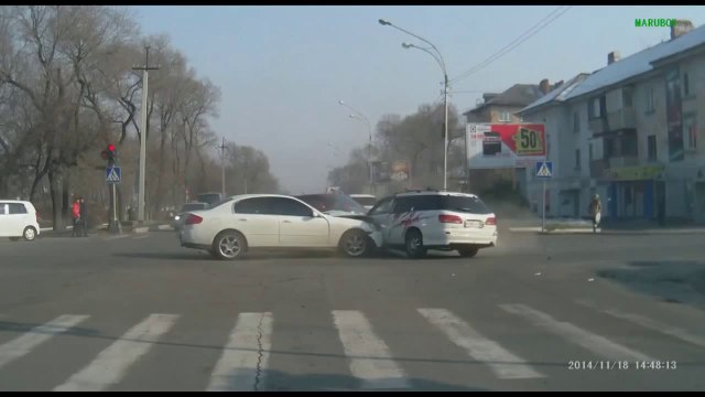 Crazy crash at intersection - car thief driving too fast!