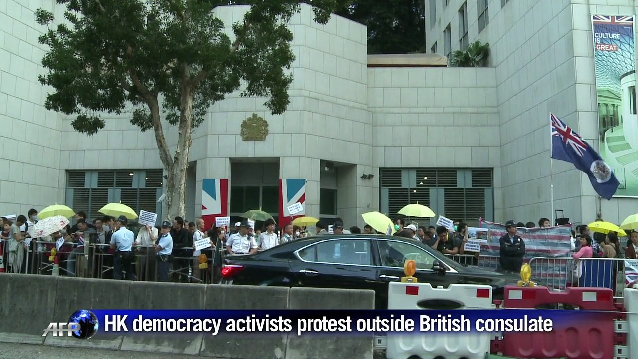 Hong Kong democracy activists protest outside British consulate